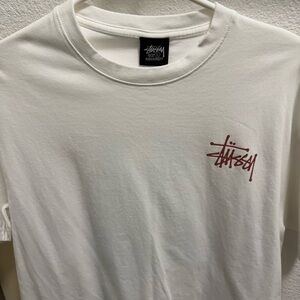 Stussy White Short Sleeve Tee with Maroon Logo